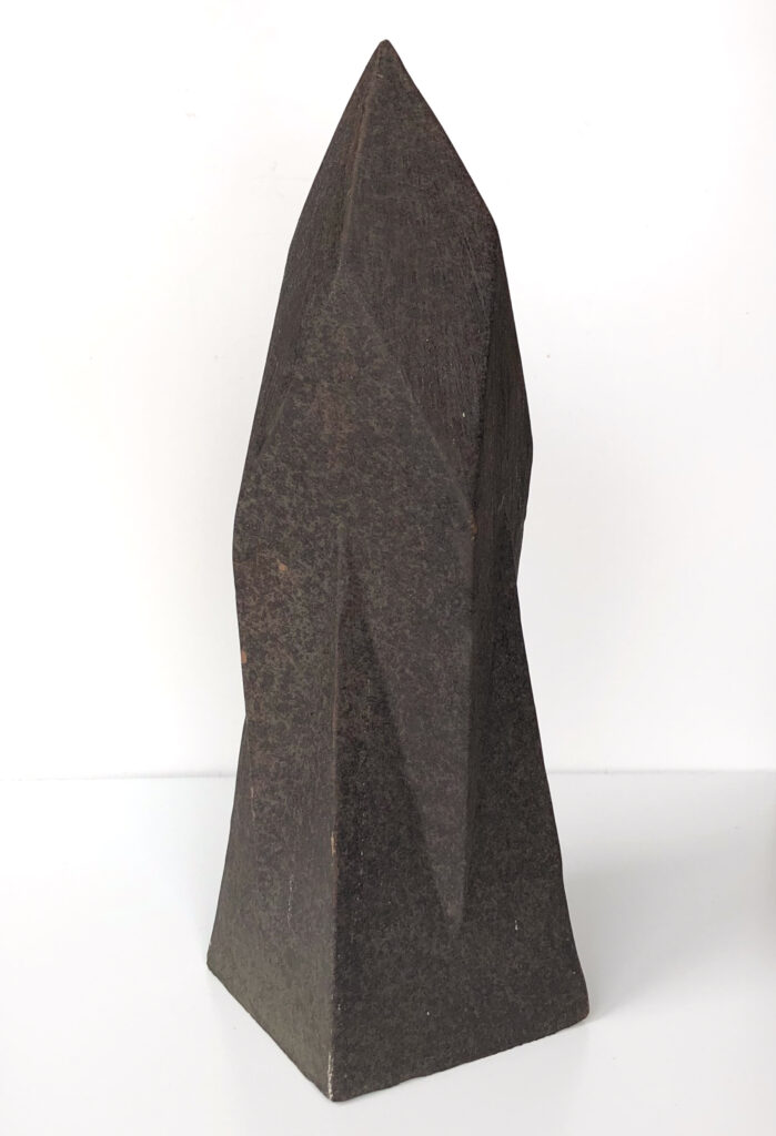 side view HERLIV Brutalist ceramic monolith sculpture in the style of Jan van der Vaart, 30cm geometric stoneware totem with manganese oxide finish.