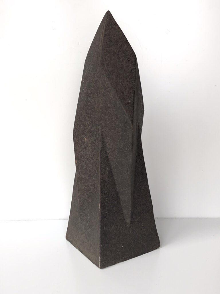 other side view side view HERLIV Brutalist ceramic monolith sculpture in the style of Jan van der Vaart, 30cm geometric stoneware totem with manganese oxide finish.