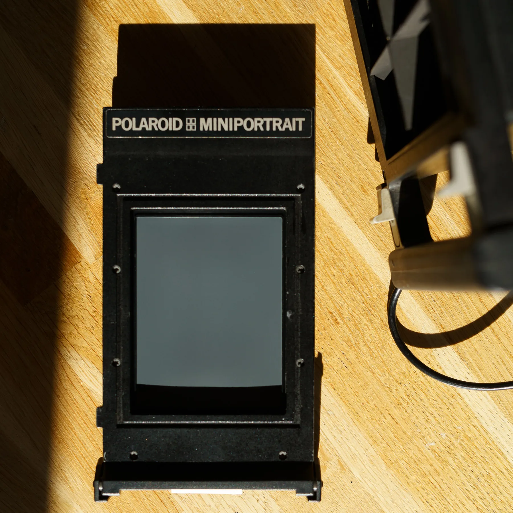 Polaroid Miniportrait Model 401 Cambo - pasfotocamera Polaroid Miniportrait 401 (foto 10)